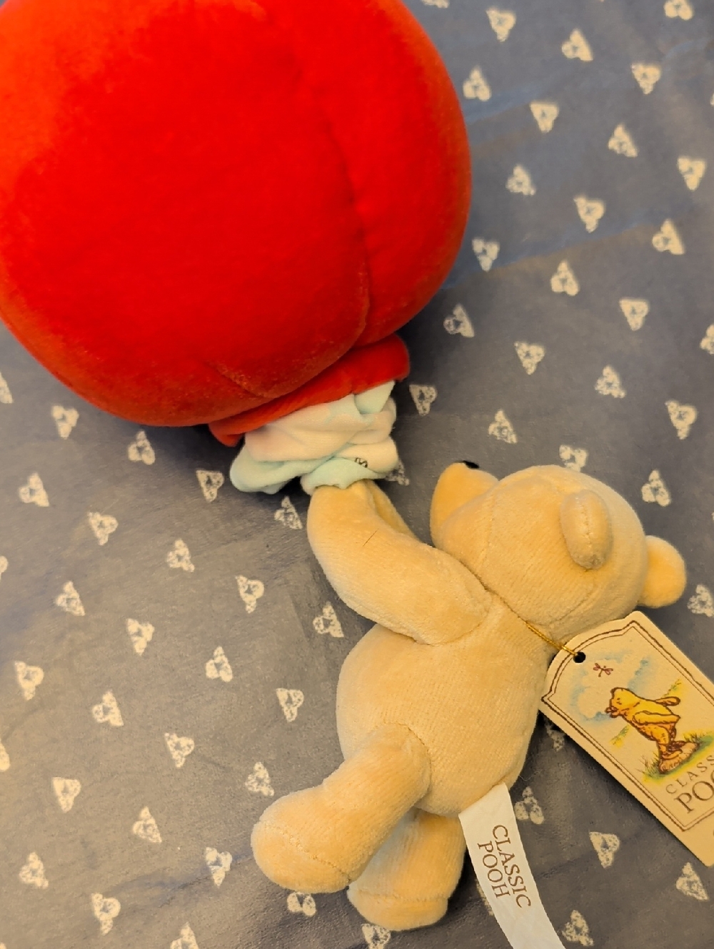 Gund Winnie the Pooh Plush with Bright Red Balloon